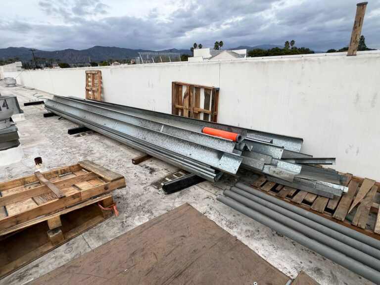 Technician performing electrical work on a solar site.