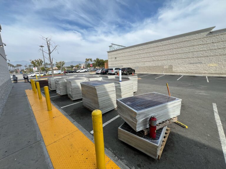 View of a solar installation site showing equipment and project scale.