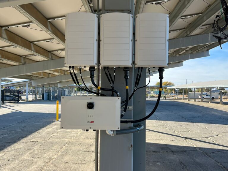 Close-up of wiring connections or component installation during the inverter upgrade.