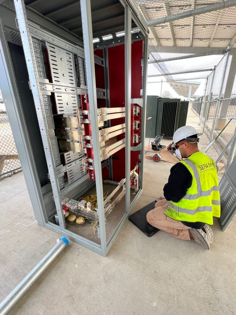 Vertical view of a section of the solar carport structure with new electrical conduit and wiring.