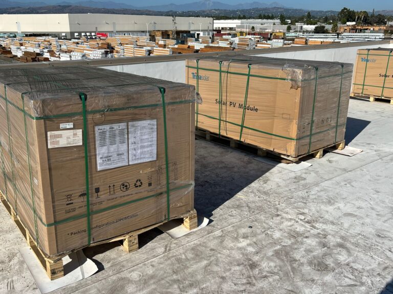 Solar inverter or electrical disconnect box installed on a Public Storage building exterior.