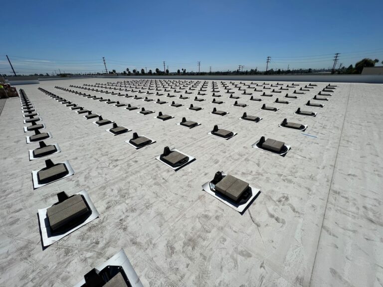 Close-up of secured solar panels on the roof of the Public Storage facility.
