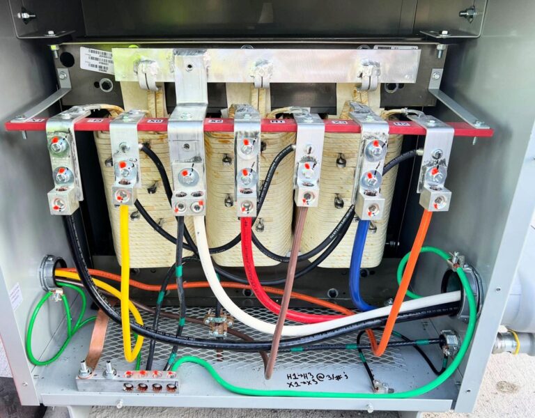 Vertical shot of a newly installed EV charger and its connection point.